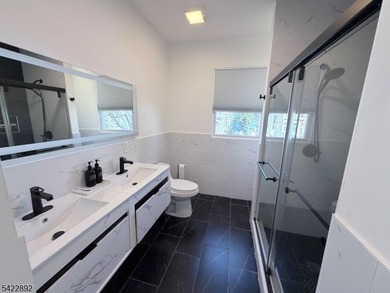 Welcome to this exceptional, fully renovated two-family - photo 16