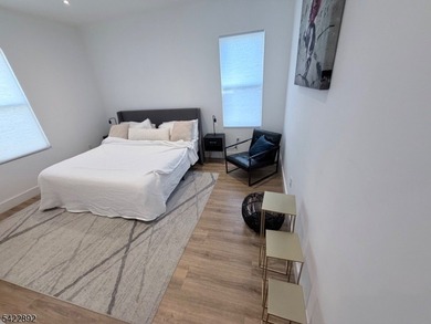 Welcome to this exceptional, fully renovated two-family - photo 18