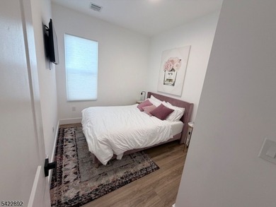 Welcome to this exceptional, fully renovated two-family - photo 19
