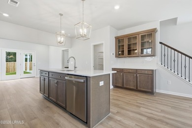 This two-story home includes three bedrooms and two and one-half - photo 8
