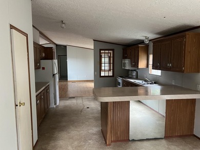 Nestled on 20 beautiful wooded acres, this 3-bedroom, 2-bath - photo 14