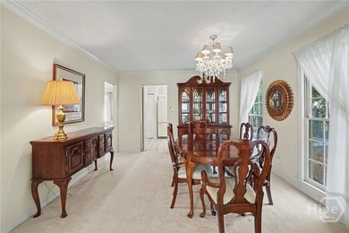Tucked into a walkable enclave of town, this two-story townhome - photo 14