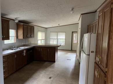 Nestled on 20 beautiful wooded acres, this 3-bedroom, 2-bath - photo 15
