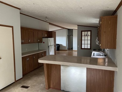Nestled on 20 beautiful wooded acres, this 3-bedroom, 2-bath - photo 16
