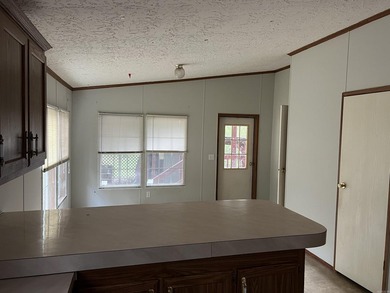 Nestled on 20 beautiful wooded acres, this 3-bedroom, 2-bath - photo 18