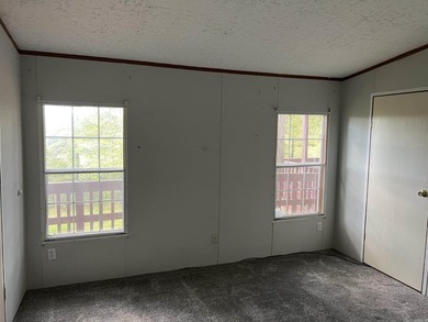 Nestled on 20 beautiful wooded acres, this 3-bedroom, 2-bath - photo 22
