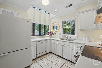 Tucked into a walkable enclave of town, this two-story townhome - photo 22