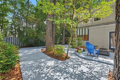 Tucked into a walkable enclave of town, this two-story townhome - photo 33