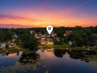 Wake up to sweeping views of Pine Island Pond from this charming - photo 2