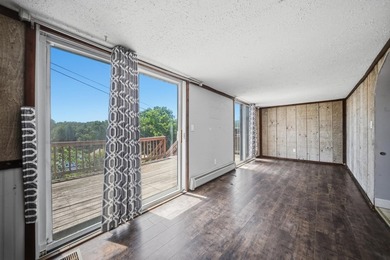 Wake up to sweeping views of Pine Island Pond from this charming - photo 6