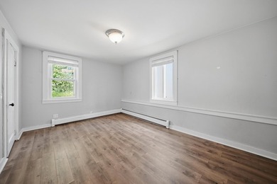 Wake up to sweeping views of Pine Island Pond from this charming - photo 9