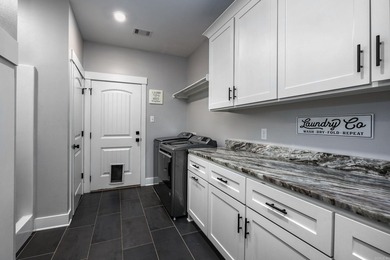 Beautiful custom home built by Alan Schrader in the desirable - photo 30