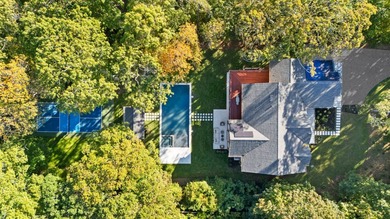 Tucked away on a quiet lane just moments from East Hampton - photo 1
