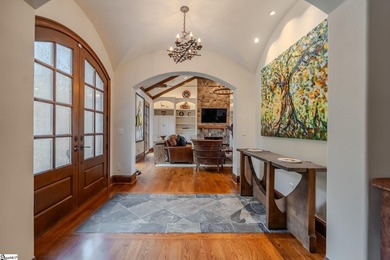 Beneath a vaulted ceiling lined with exposed wood beams and - photo 7
