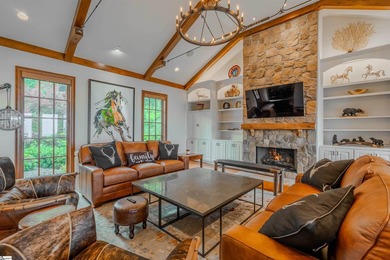 Beneath a vaulted ceiling lined with exposed wood beams and - photo 8