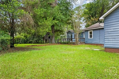 Nestled in the heart of Isle of Hope on large corner lot, this - photo 33