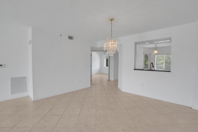 Bright, spacious 3BR/2BA corner unit in Coral Lakes, a premier