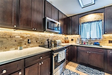 Welcome to this charming 3-bedroom, 2-bath home in the highly - photo 13