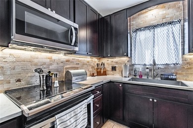 Welcome to this charming 3-bedroom, 2-bath home in the highly - photo 14
