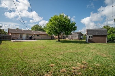 Welcome to this charming 3-bedroom, 2-bath home in the highly - photo 29