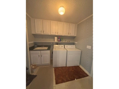 This property has so much to offer! Enjoy the ease of single