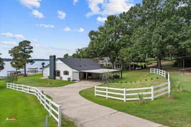 Spectacular waterfront home and DEEDED land in East Texas! - Lake Home For Sale in Carthage, Texas