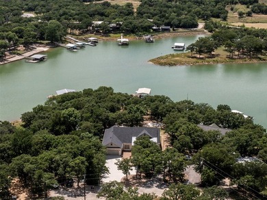 Experience lakeside living at its finest in this beautiful - photo 1