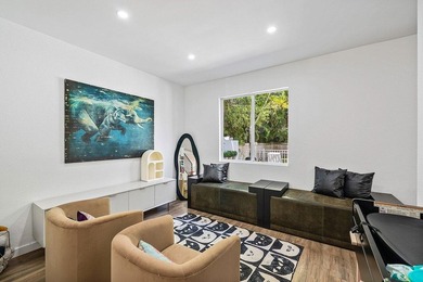 A beautiful 5 BD 3 BA two-story home in Boca Vistas with chic - photo 13