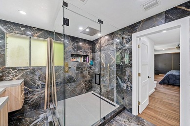 A beautiful 5 BD 3 BA two-story home in Boca Vistas with chic - photo 19