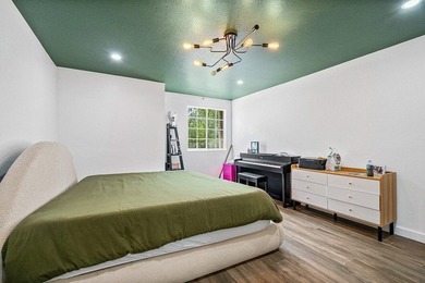 A beautiful 5 BD 3 BA two-story home in Boca Vistas with chic - photo 22