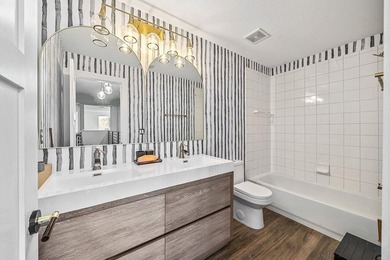 A beautiful 5 BD 3 BA two-story home in Boca Vistas with chic - photo 23