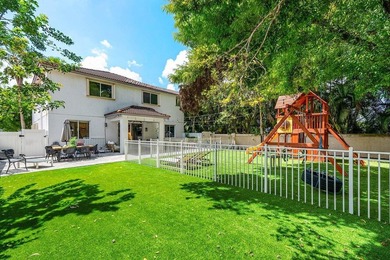 A beautiful 5 BD 3 BA two-story home in Boca Vistas with chic - photo 26
