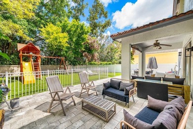 A beautiful 5 BD 3 BA two-story home in Boca Vistas with chic - photo 29