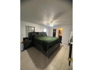 Investment opportunity awaits! This charming 3-bedroom pool home - photo 11