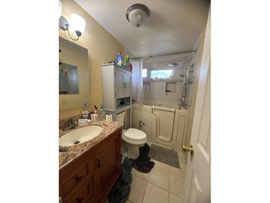 Investment opportunity awaits! This charming 3-bedroom pool home - photo 14