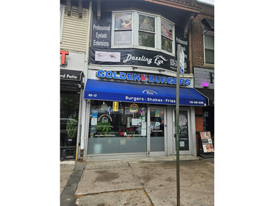 It is located in Bayside's main business district. Bell Blvd in - photo 3