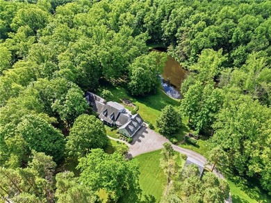 Nestled within 25 acres of meadows and woodland, this private - photo 36
