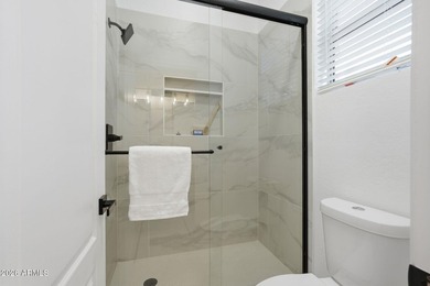 beautifully remodeled powder room adds convenience for guests - photo 50