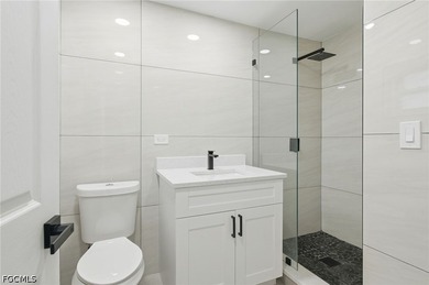 Welcome to this beautifully renovated pool home in the highly - photo 12