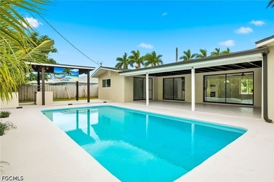 Welcome to this beautifully renovated pool home in the highly - photo 13