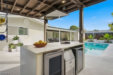 Welcome to this beautifully renovated pool home in the highly - photo 17