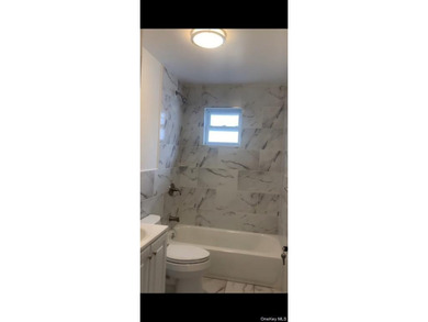 RENOVATION COMPLETE! I am delighted to present this exclusive - photo 4