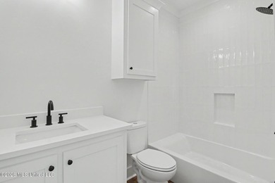 Welcome to this stunning new construction waterfront home! This - photo 13