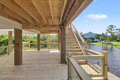 Welcome to this stunning new construction waterfront home! This - photo 24