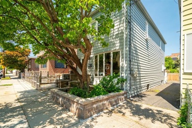 Well maintained and thoughtfully updated, this Morris Park - photo 1