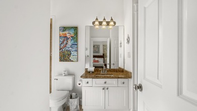 Introducing a charming coastal cottage located in the heart of - photo 6