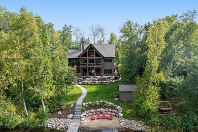 Discover an extraordinary lakefront estate on prestigious - photo 1