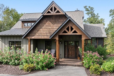 Discover an extraordinary lakefront estate on prestigious - photo 3