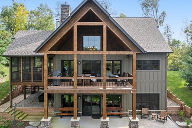 Discover an extraordinary lakefront estate on prestigious - photo 5