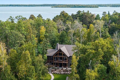 Discover an extraordinary lakefront estate on prestigious - photo 6